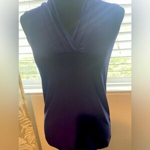 Like New beautiful purple sleeveless blouse.